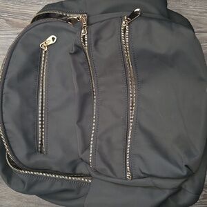 WAKATI green Backpack with Gold Accents